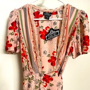 Long wrap style dress . Perfect for warm weather .